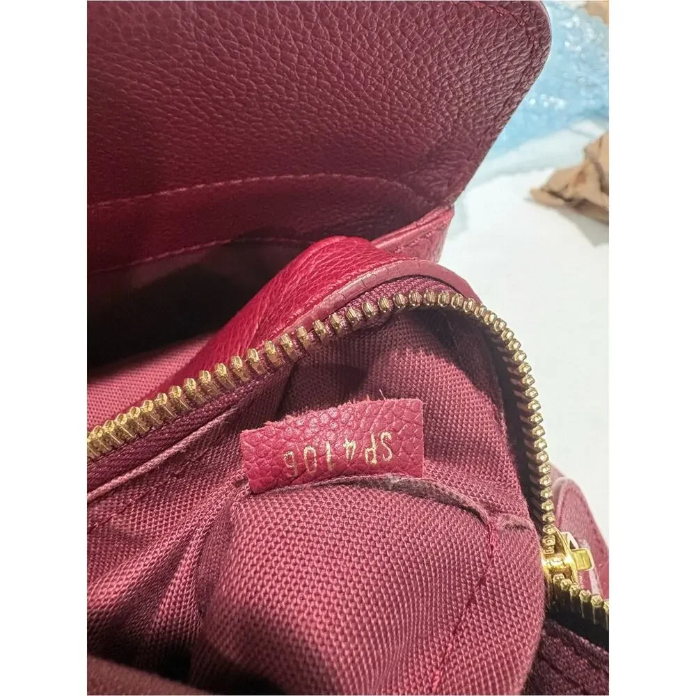 Authentic Louis Vuitton Monogram Empreinte Montaigne MM bag w/ Certificateate